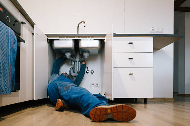 Professional Drain Cleaning technician working in Mc Alpin, FL